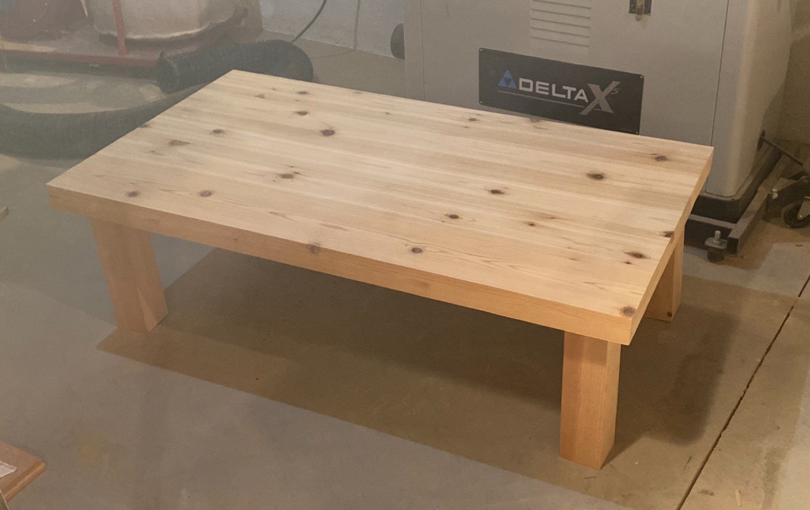 Underside of the table showing screw-on legs