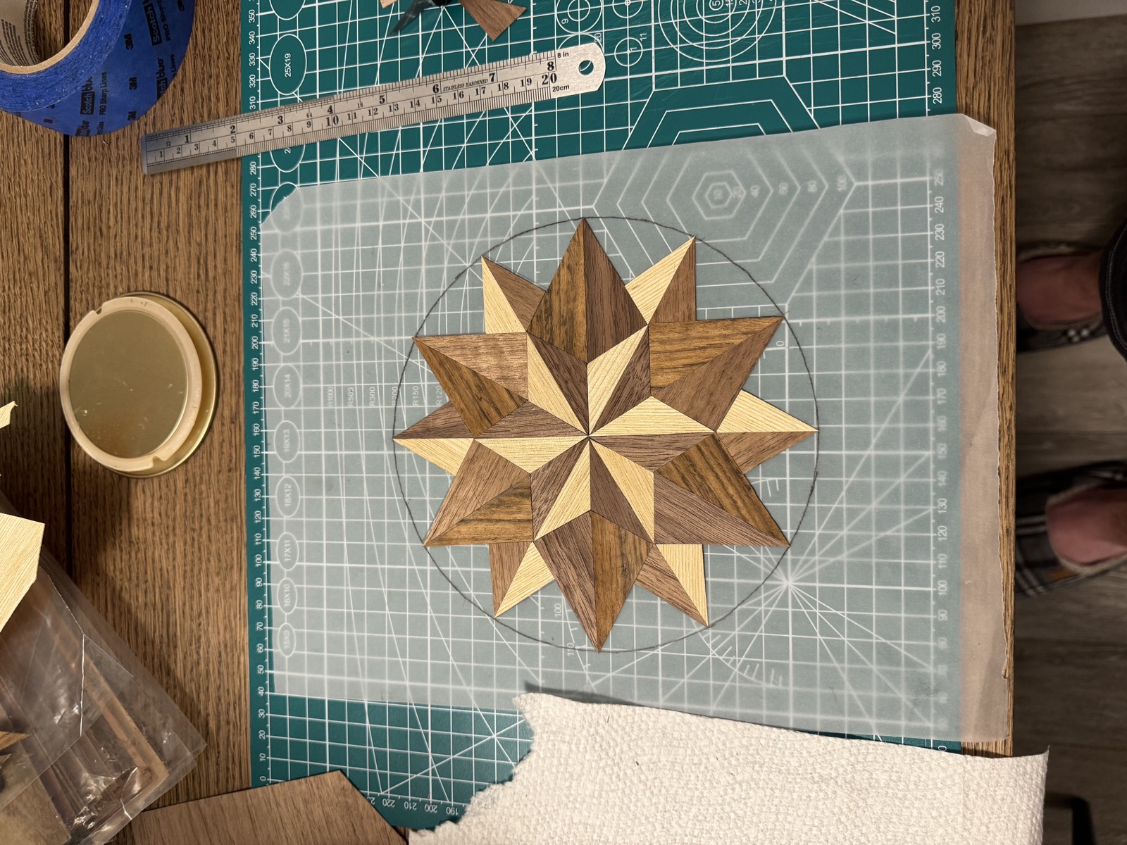 The completed sixteen point star assembled on the paper pattern