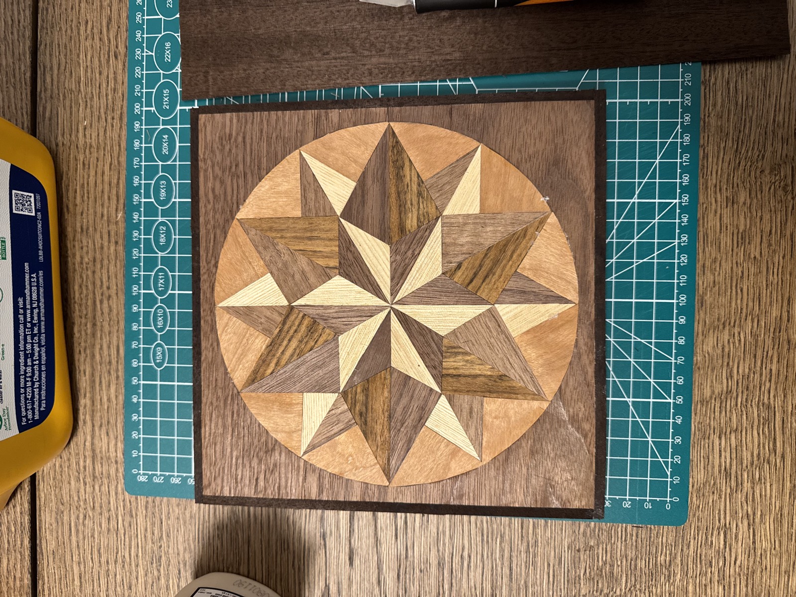 The pressed panel, seams tight and surface flat, still on the cutting mat