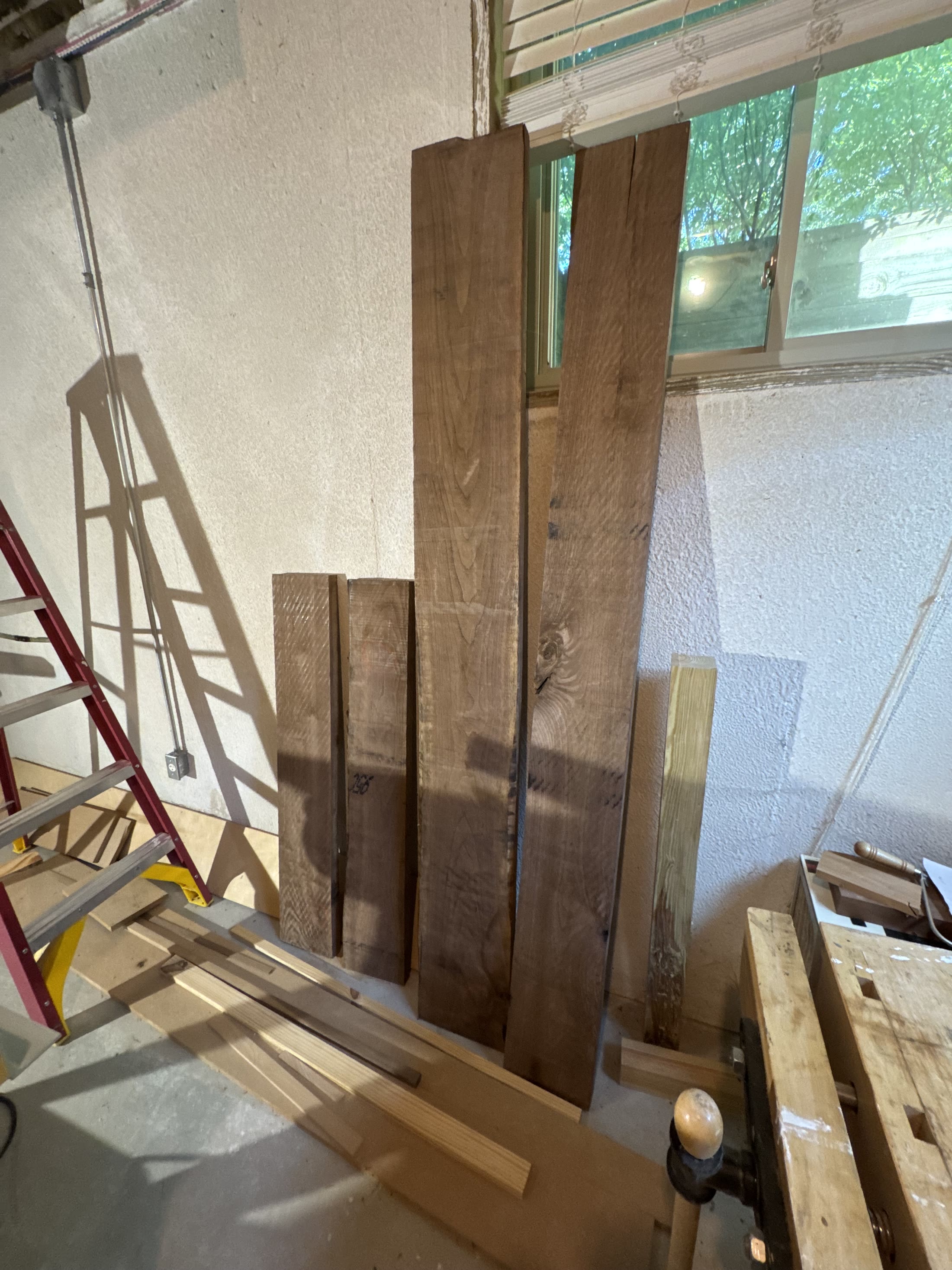 Rough black walnut boards before milling