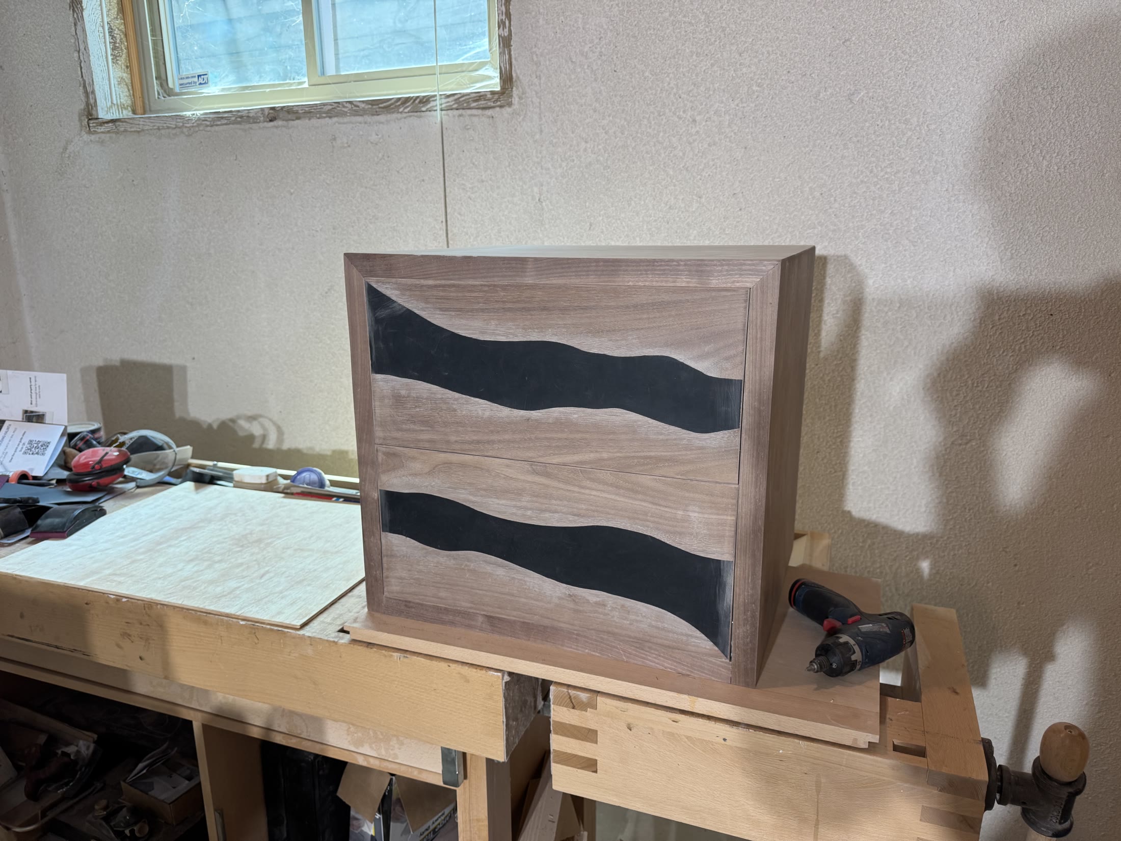 Assembled nightstand before finish, grain looking flat and grey