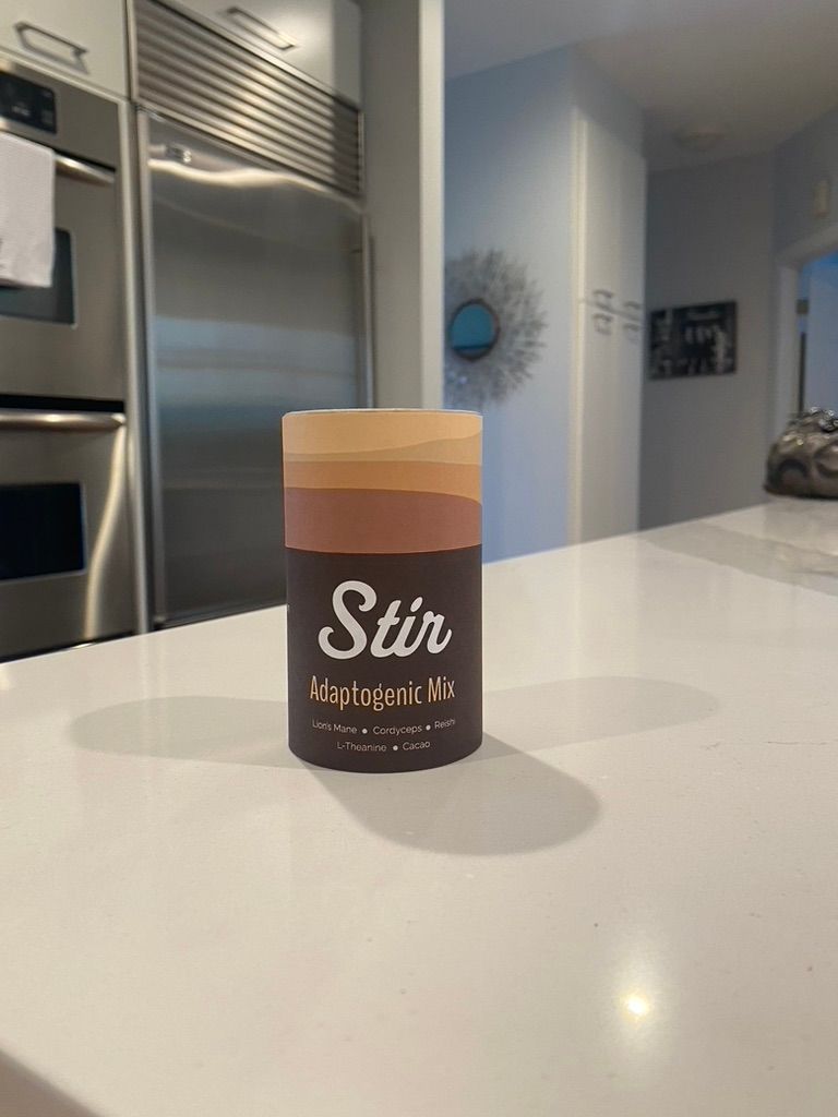 Label design printed on paper and wrapped around a tube